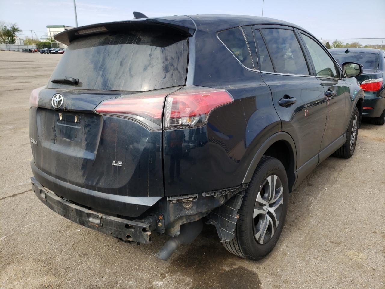 Photo 4 from auction – 2017 TOYOTA RAV4 LE with VIN JTMZFREV7HJ721310