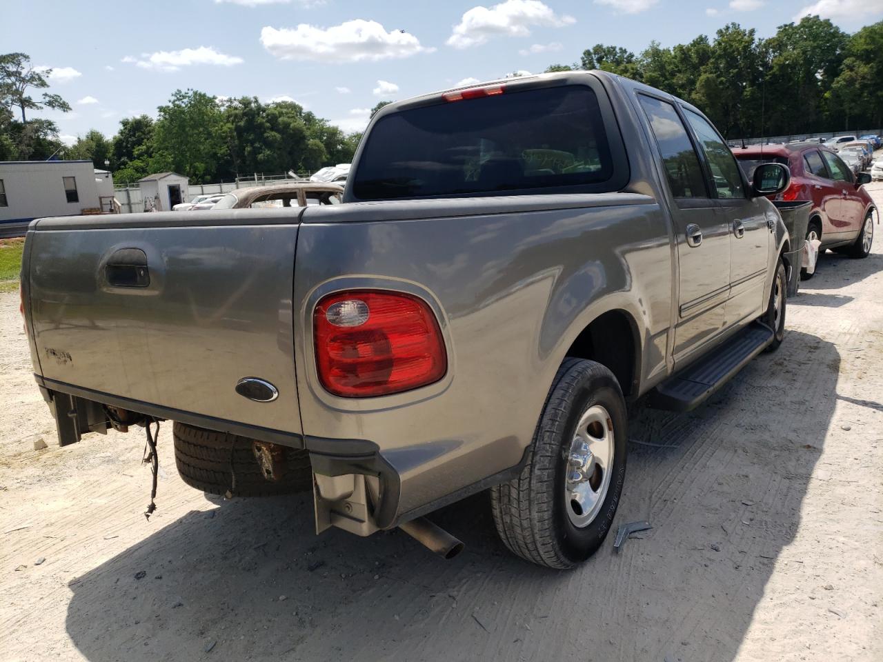 Photo 4 from auction – 2001 FORD F150 SUPER with VIN 1FTRW07W11KD74512