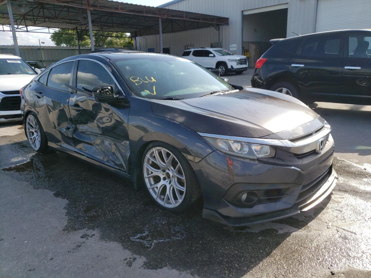 HONDA CIVIC EXL 2016 with VIN 19XFC1F75GE039583 - Photo from auction