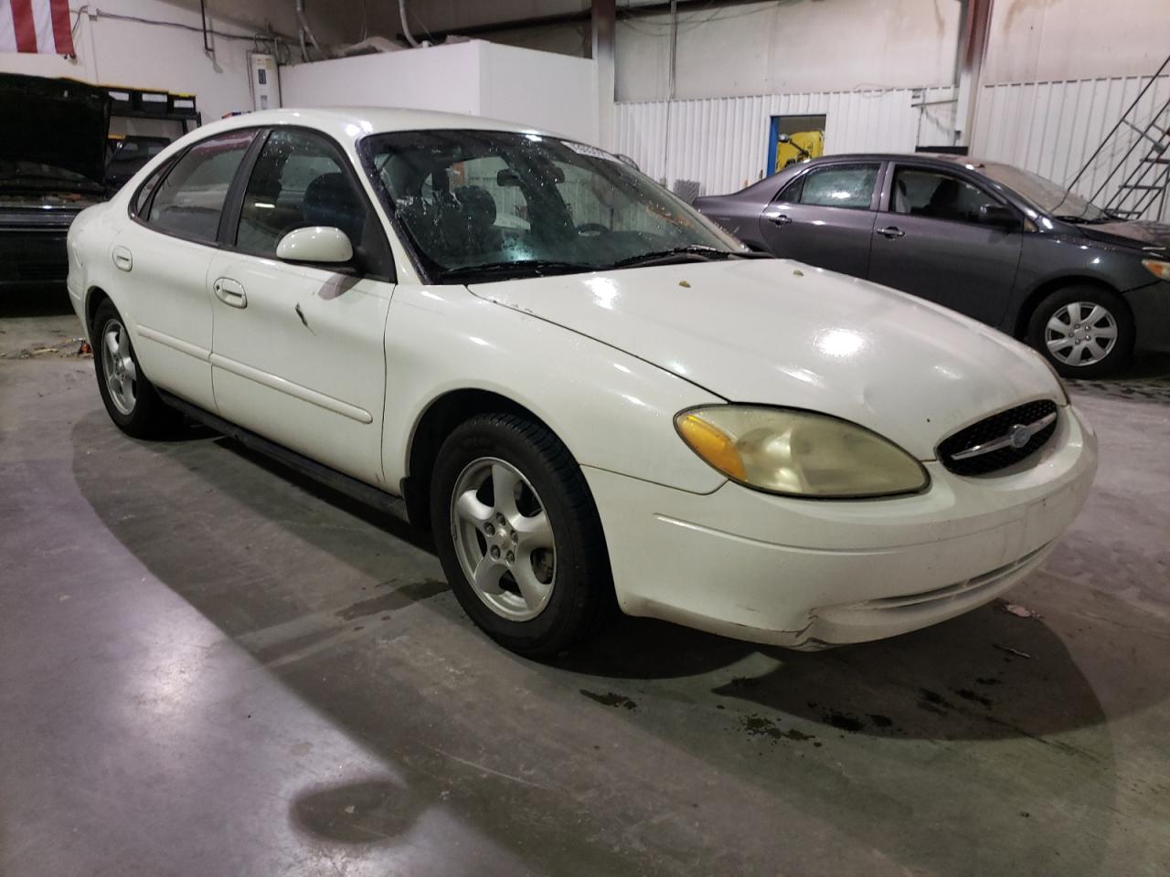 FORD TAURUS SES 2003 with VIN 1FAFP552X3A172554 - Photo from auction