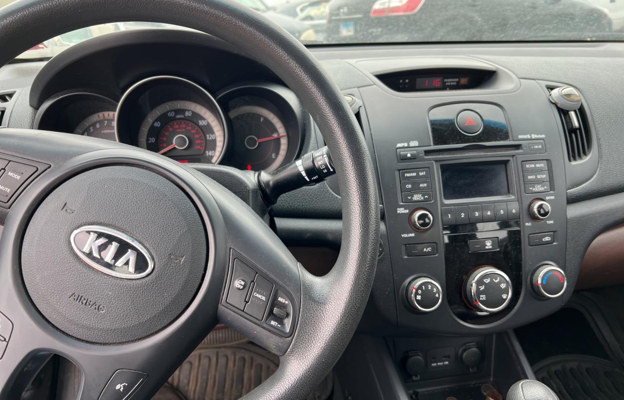 Photo 9 from auction – 2010 KIA FORTE EX with VIN KNAFU4A23A5834691