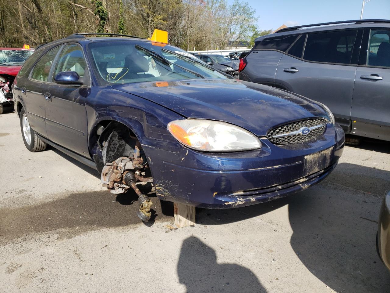 FORD TAURUS SE 2000 with VIN 1FAFP58U3YG147853 - Photo from auction