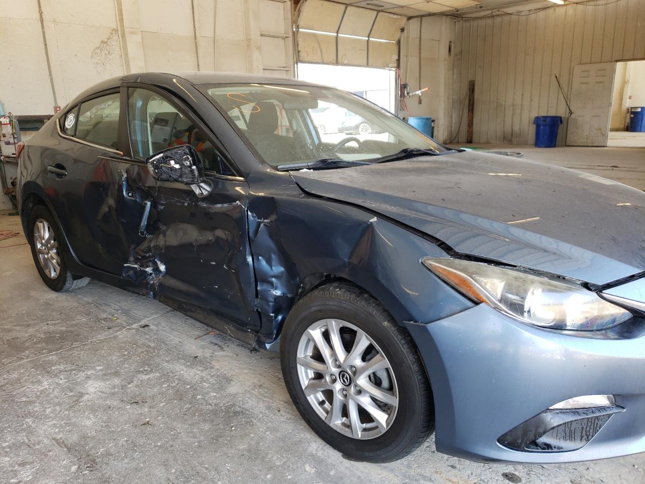 Photo 9 from auction – 2014 MAZDA 3 TOURING with VIN JM1BM1V78E1186056