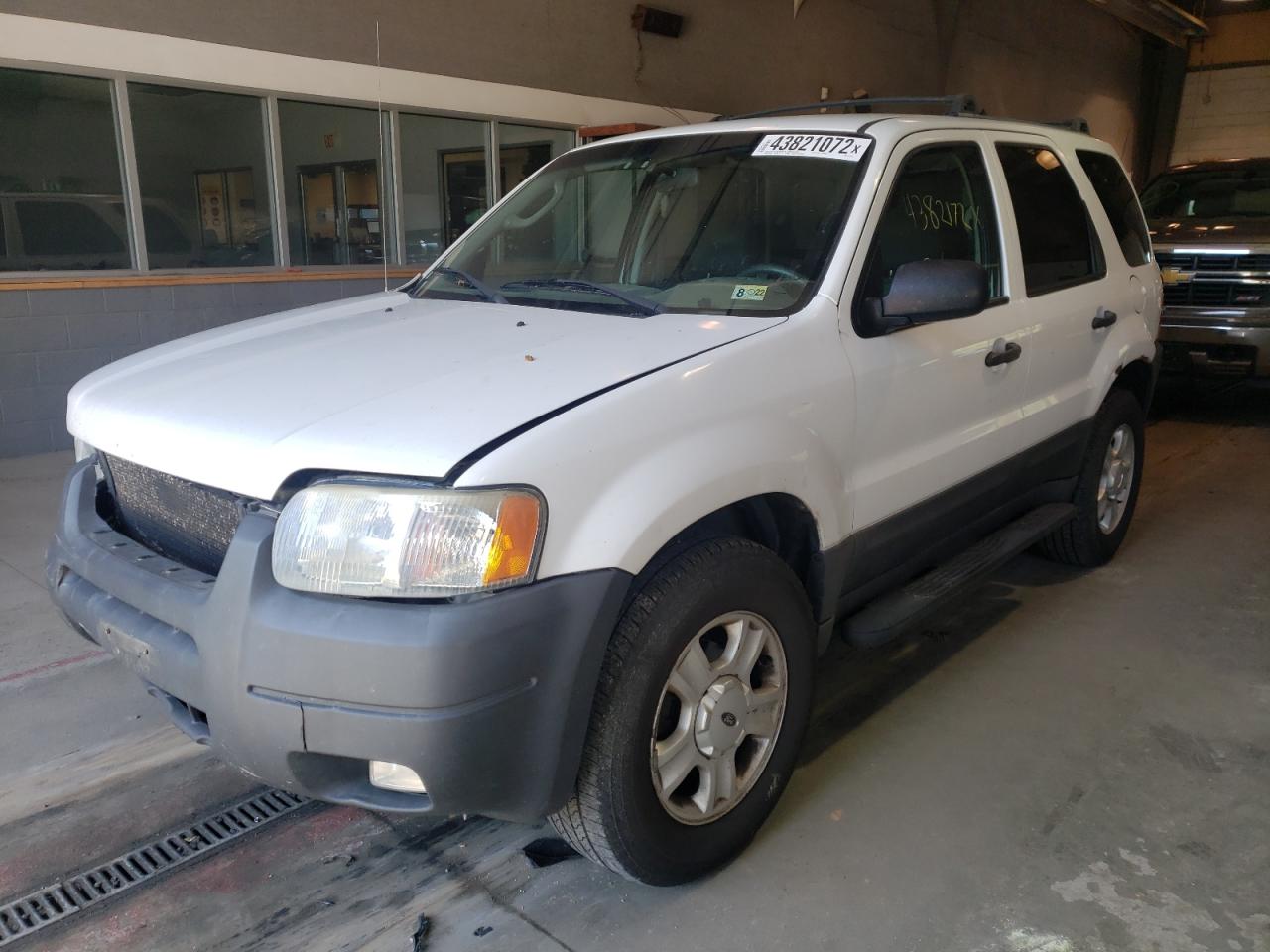 Photo 2 from auction – 2003 FORD ESCAPE XLT with VIN 1FMYU03123KB10709