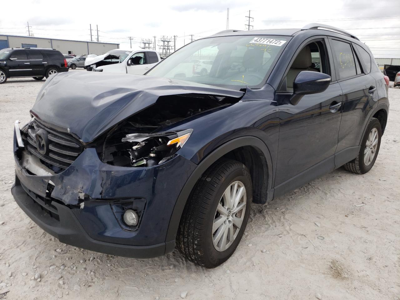Photo 2 from auction – 2016 MAZDA CX-5 TOURI with VIN JM3KE2CY0G0669541