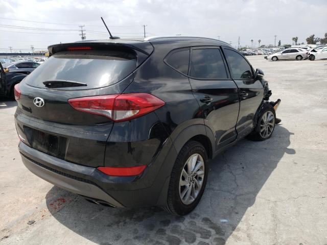 Photo 4 from auction – 2016 HYUNDAI TUCSON LIM with VIN KM8J33A20GU240354