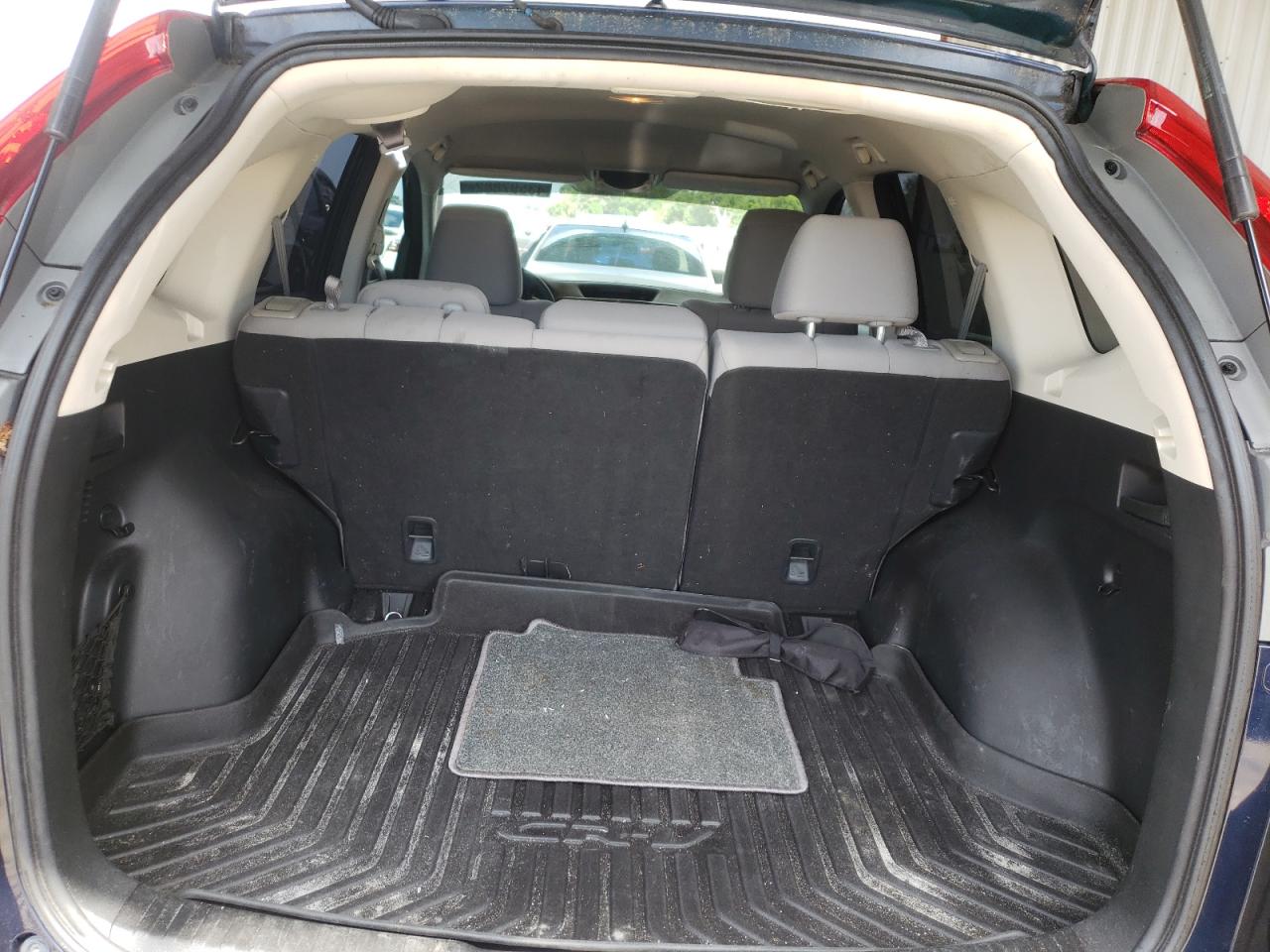 Photo 9 from auction – 2016 HONDA CR-V SE with VIN 2HKRM3H41GH522749