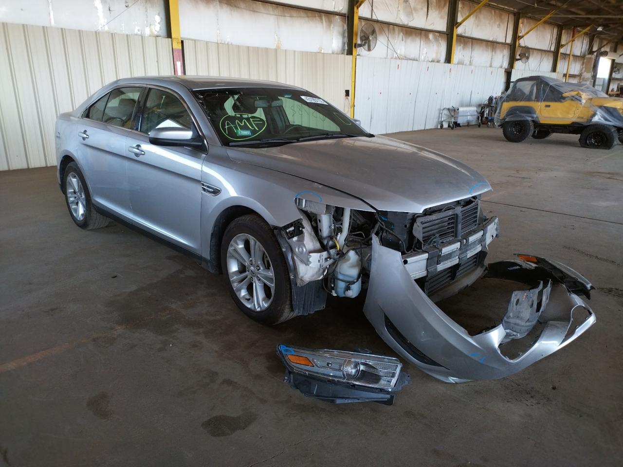FORD TAURUS SEL 2013 with VIN 1FAHP2E84DG211701 - Photo from auction