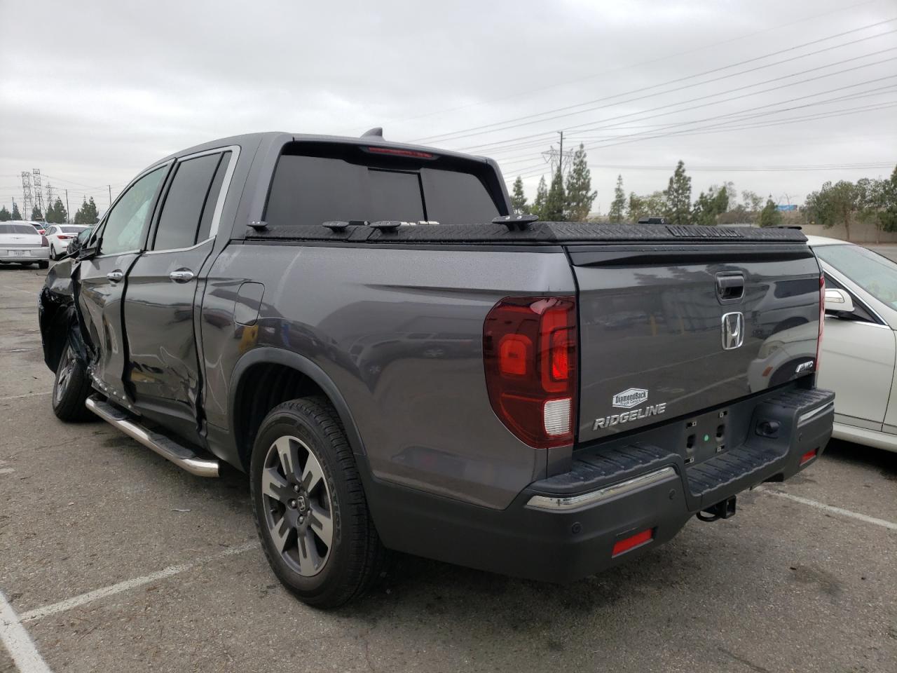 Photo 3 from auction – 2017 HONDA RIDGELINE with VIN 5FPYK3F78HB031228