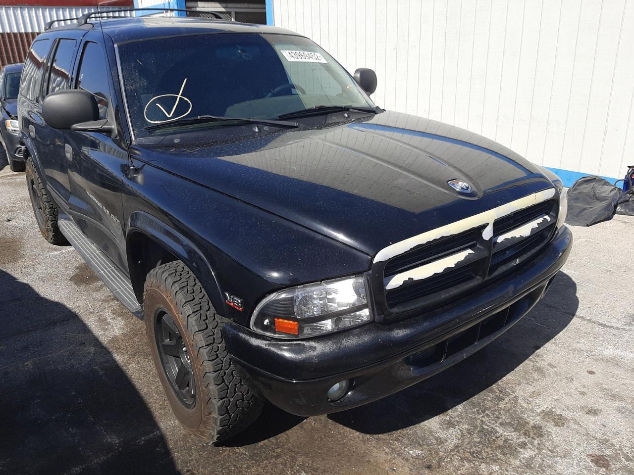 DODGE DURANGO 2000 with VIN 1B4HS28Z9YF239256 - Photo from auction