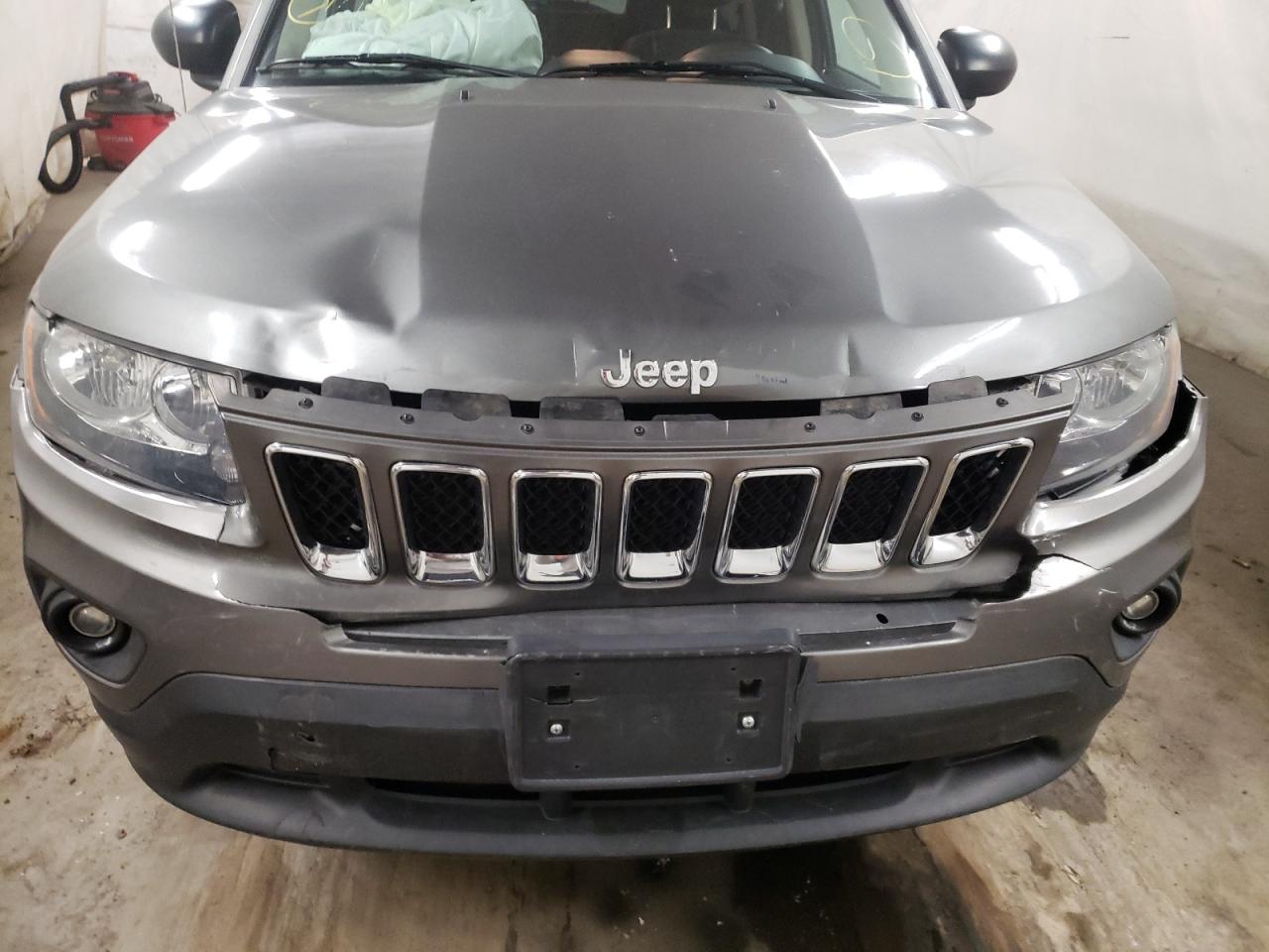 Photo 9 from auction – 2014 JEEP COMPASS SP with VIN 1C4NJDBB9ED505916