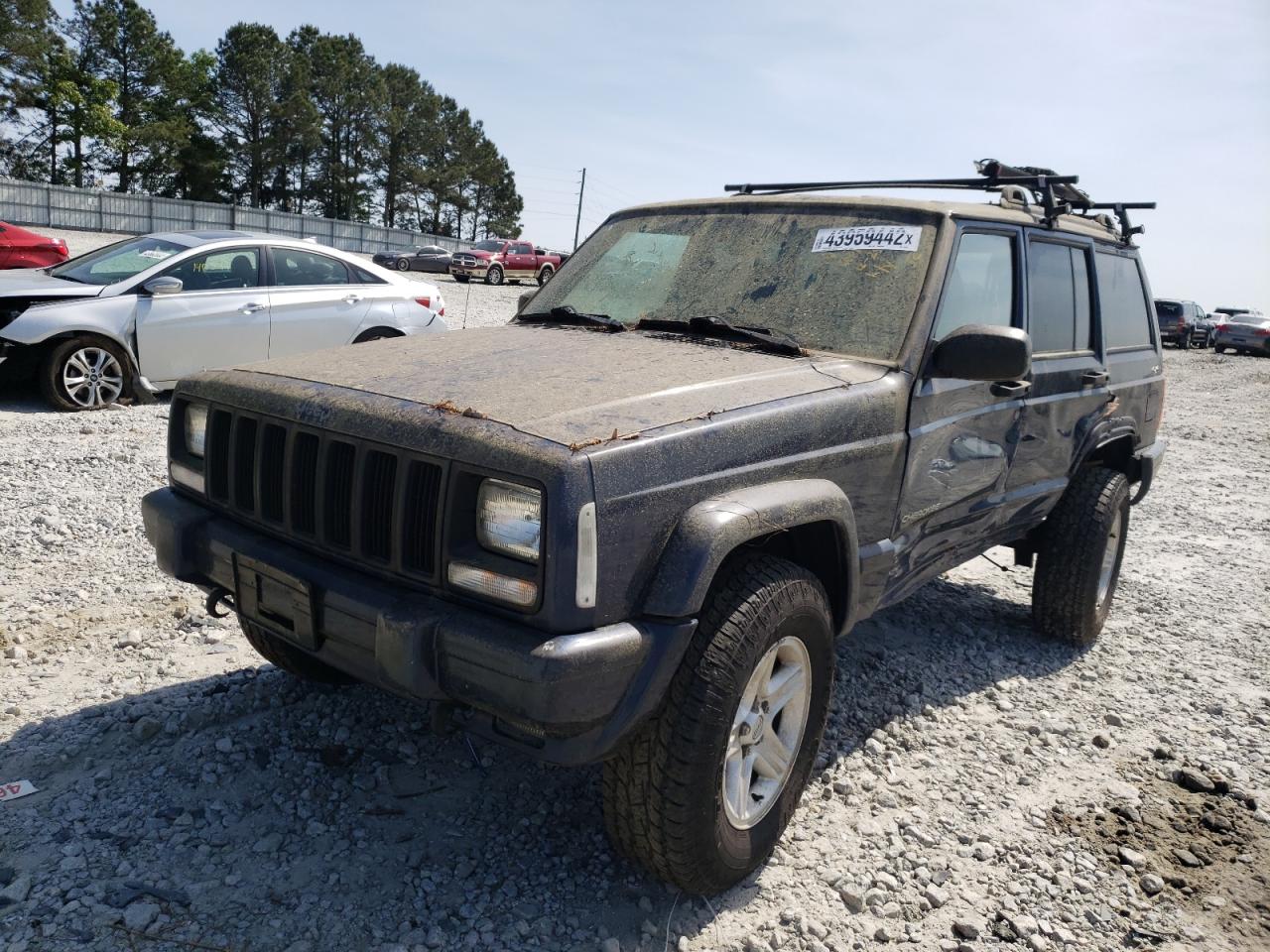 Photo 2 from auction – 2001 JEEP CHEROKEE C with VIN 1J4FF58S81L542324