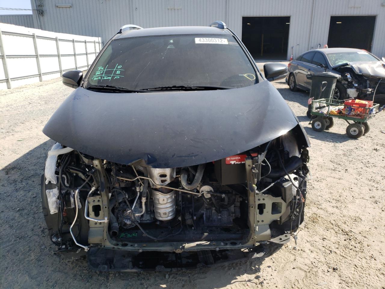 Photo 9 from auction – 2018 TOYOTA RAV4 LE with VIN 2T3ZFREV4JW432893