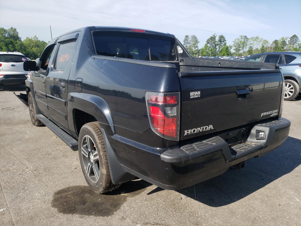Photo 3 from auction – 2014 HONDA RIDGELINE with VIN 5FPYK1F74EB001384