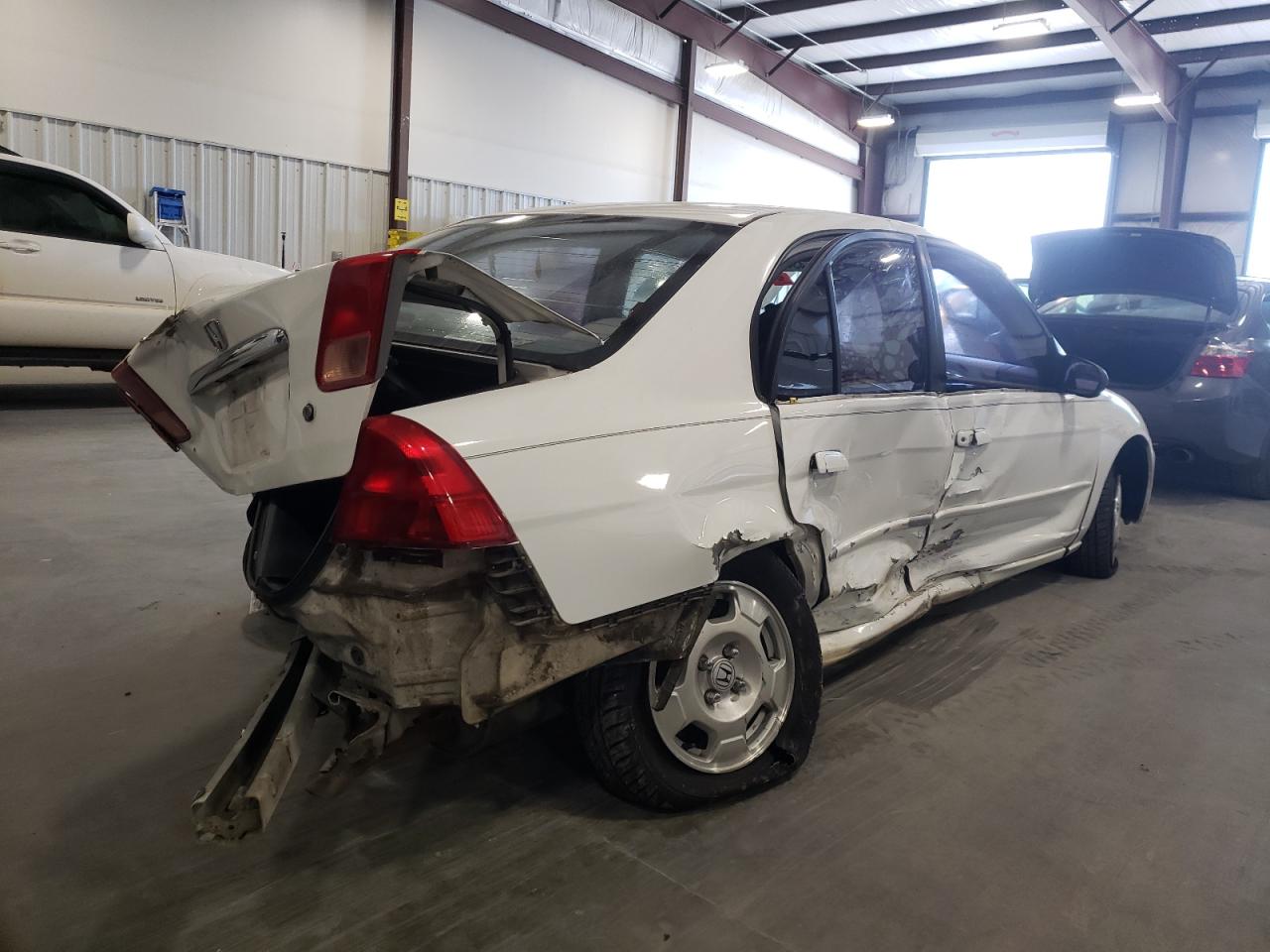 Photo 4 from auction – 2002 HONDA CIVIC LX with VIN 1HGES16512L047761