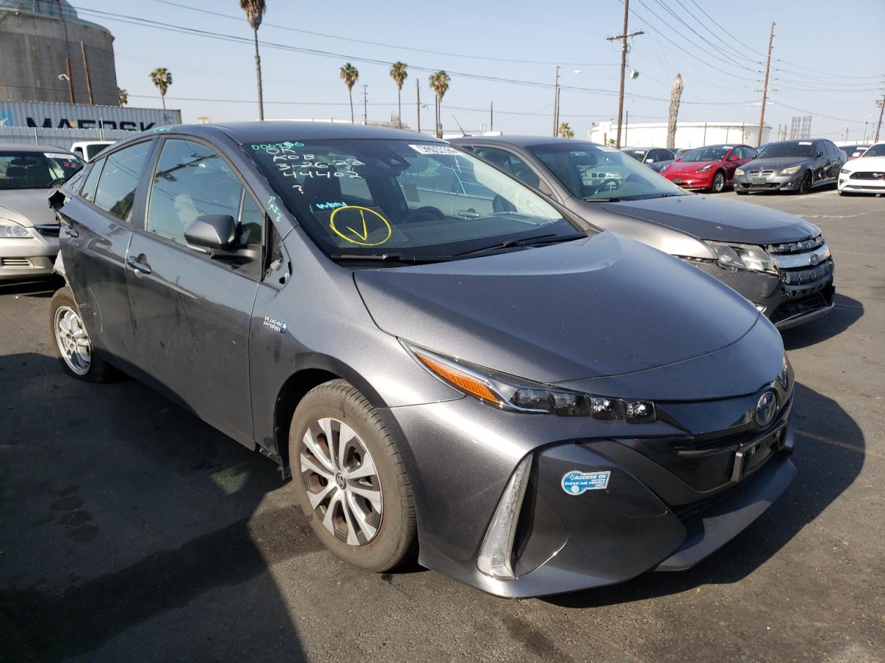 TOYOTA PRIUS PRIM 2021 with VIN JTDKAMFPXM3176589 - Photo from auction