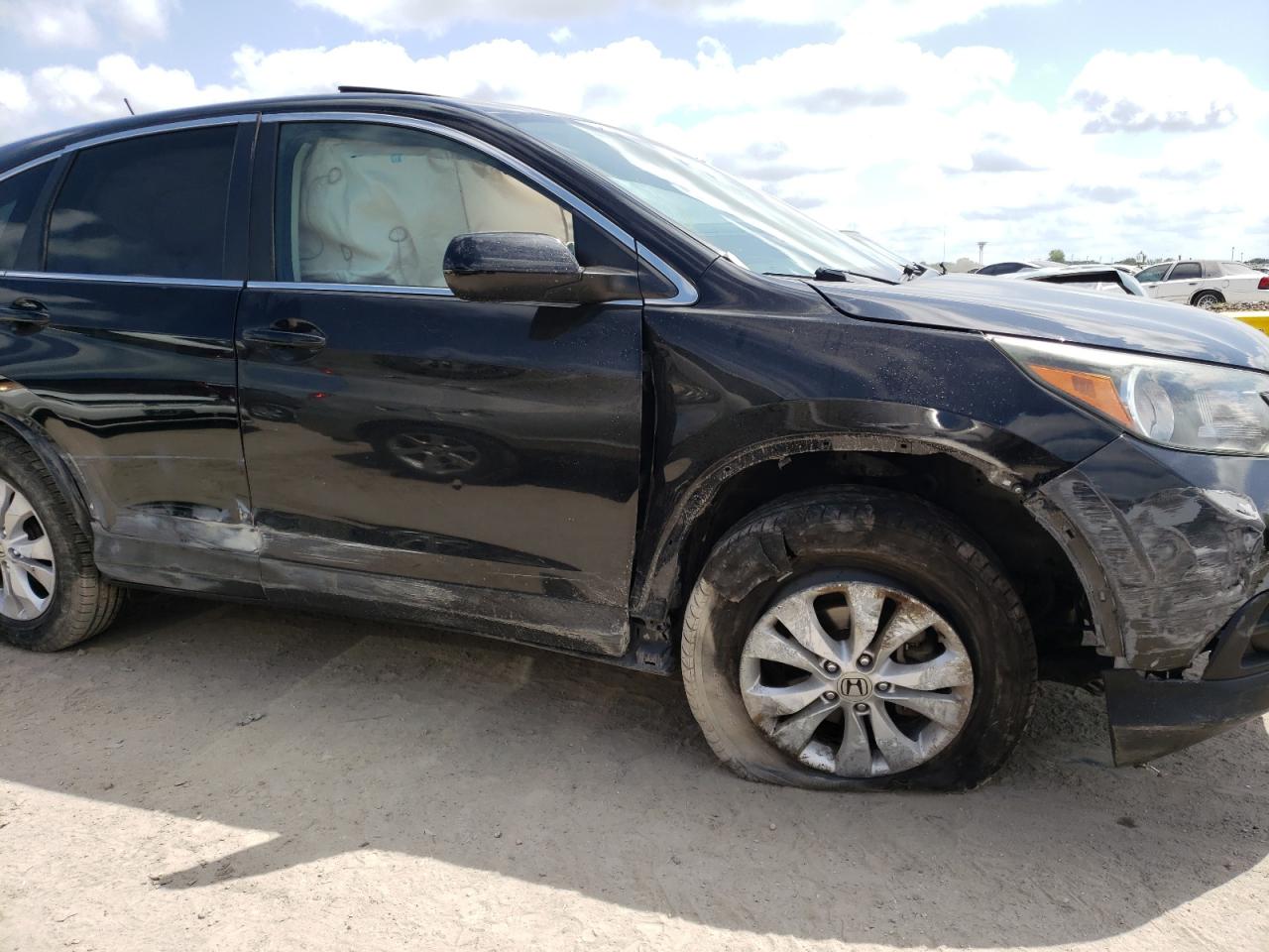 Photo 9 from auction – 2014 HONDA CR-V EX with VIN 2HKRM4H54EH633372