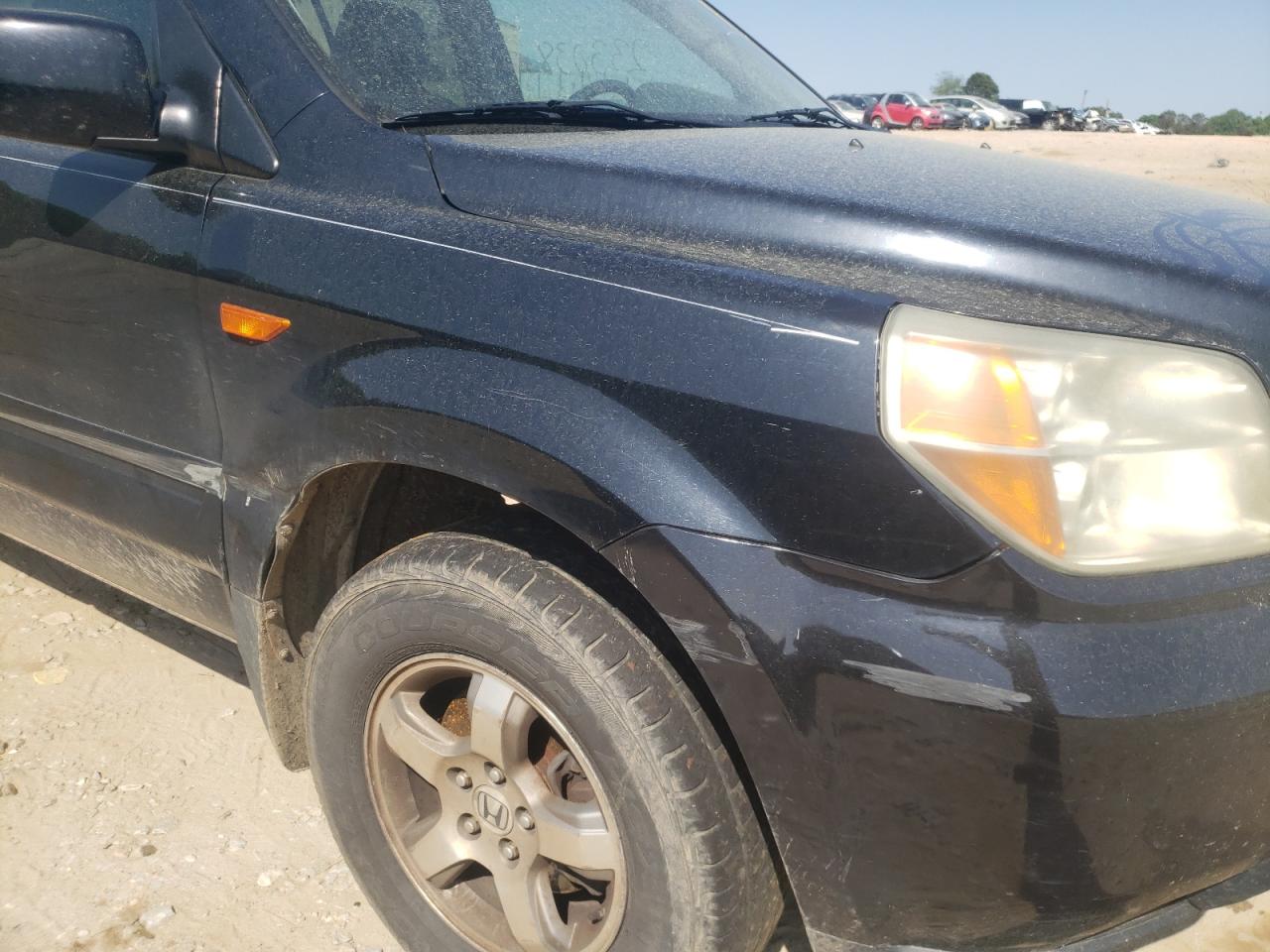 Photo 9 from auction – 2006 HONDA PILOT EX with VIN 2HKYF186X6H558434