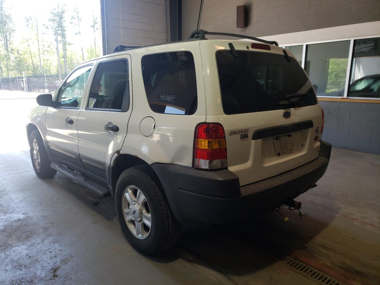 Photo 3 from auction – 2003 FORD ESCAPE XLT with VIN 1FMYU03123KB10709