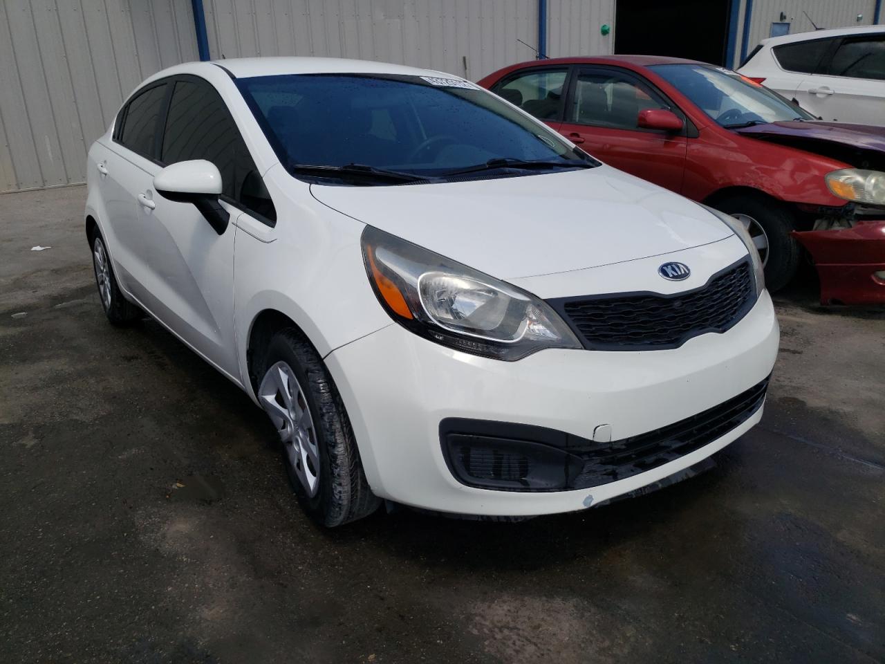 KIA RIO LX 2014 with VIN KNADM4A31E6396480 - Photo from auction