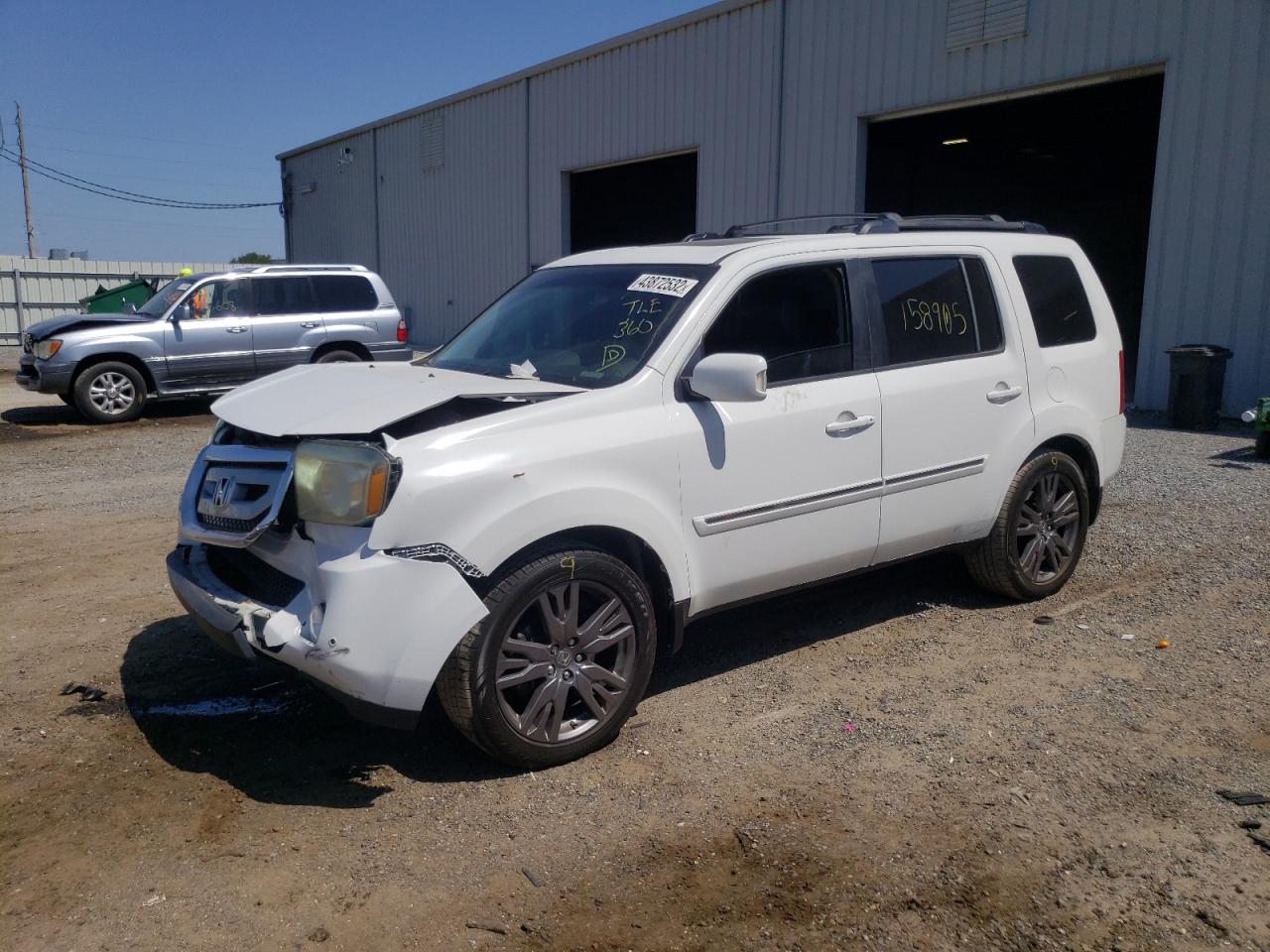 Photo 2 from auction – 2011 HONDA PILOT TOUR with VIN 5FNYF4H97BB066481