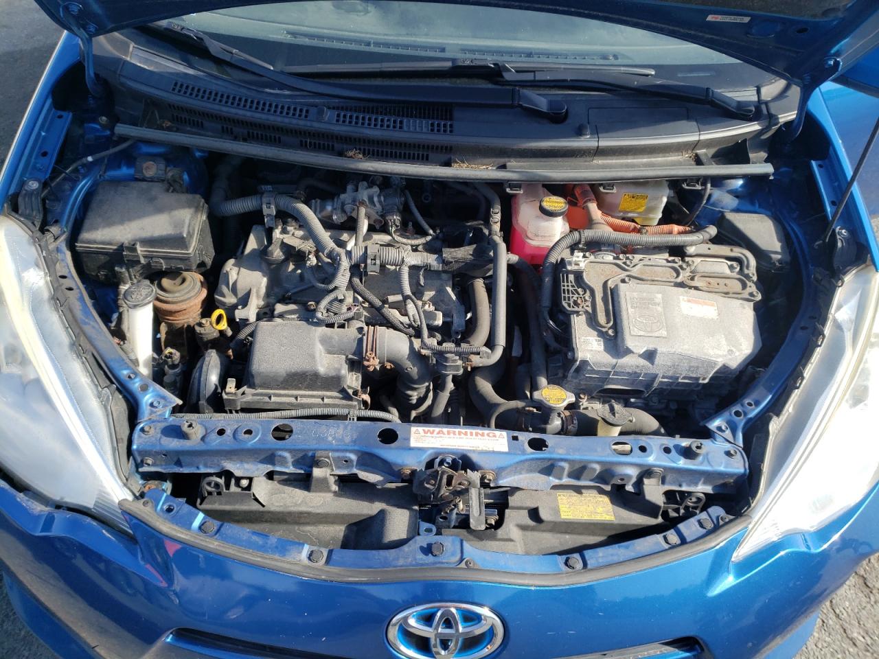 Photo 7 from auction – 2013 TOYOTA PRIUS C with VIN JTDKDTB30D1039872