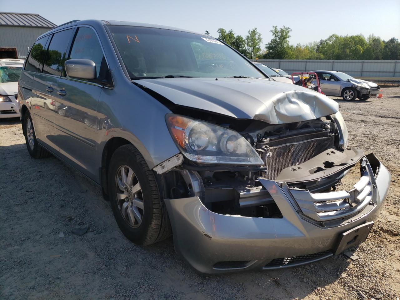 HONDA ODYSSEY EX 2010 with VIN 5FNRL3H66AB052969 - Photo from auction