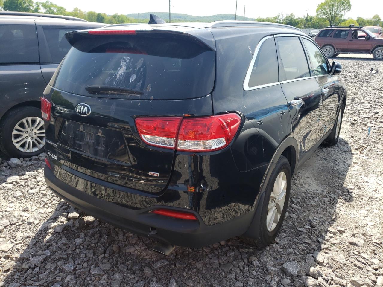 Photo 4 from auction – 2016 KIA SORENTO LX with VIN 5XYPGDA35GG039858