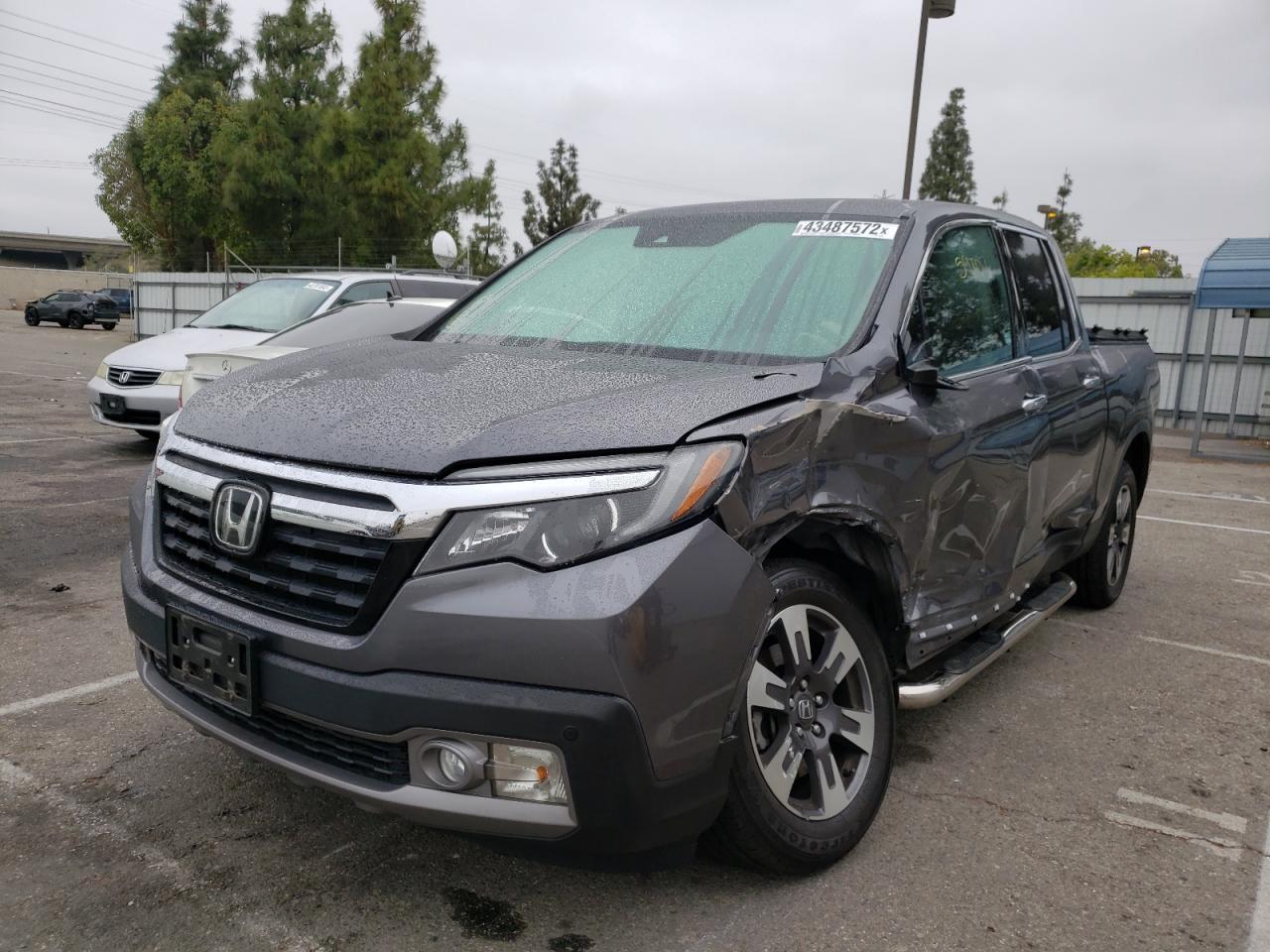 Photo 2 from auction – 2017 HONDA RIDGELINE with VIN 5FPYK3F78HB031228