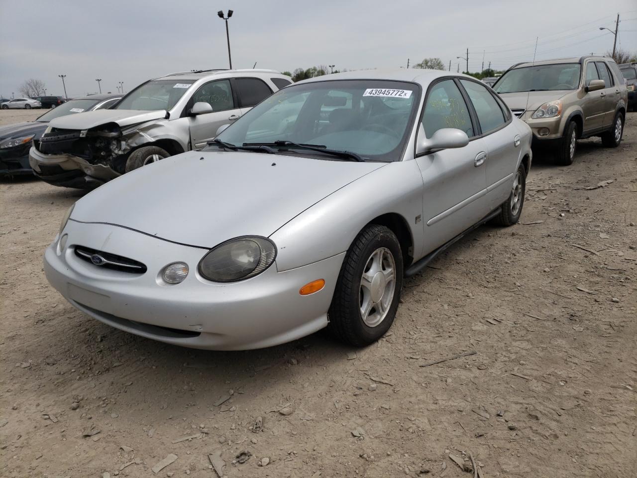 Photo 2 from auction – 1999 FORD TAURUS SE with VIN 1FAFP53S8XA124284