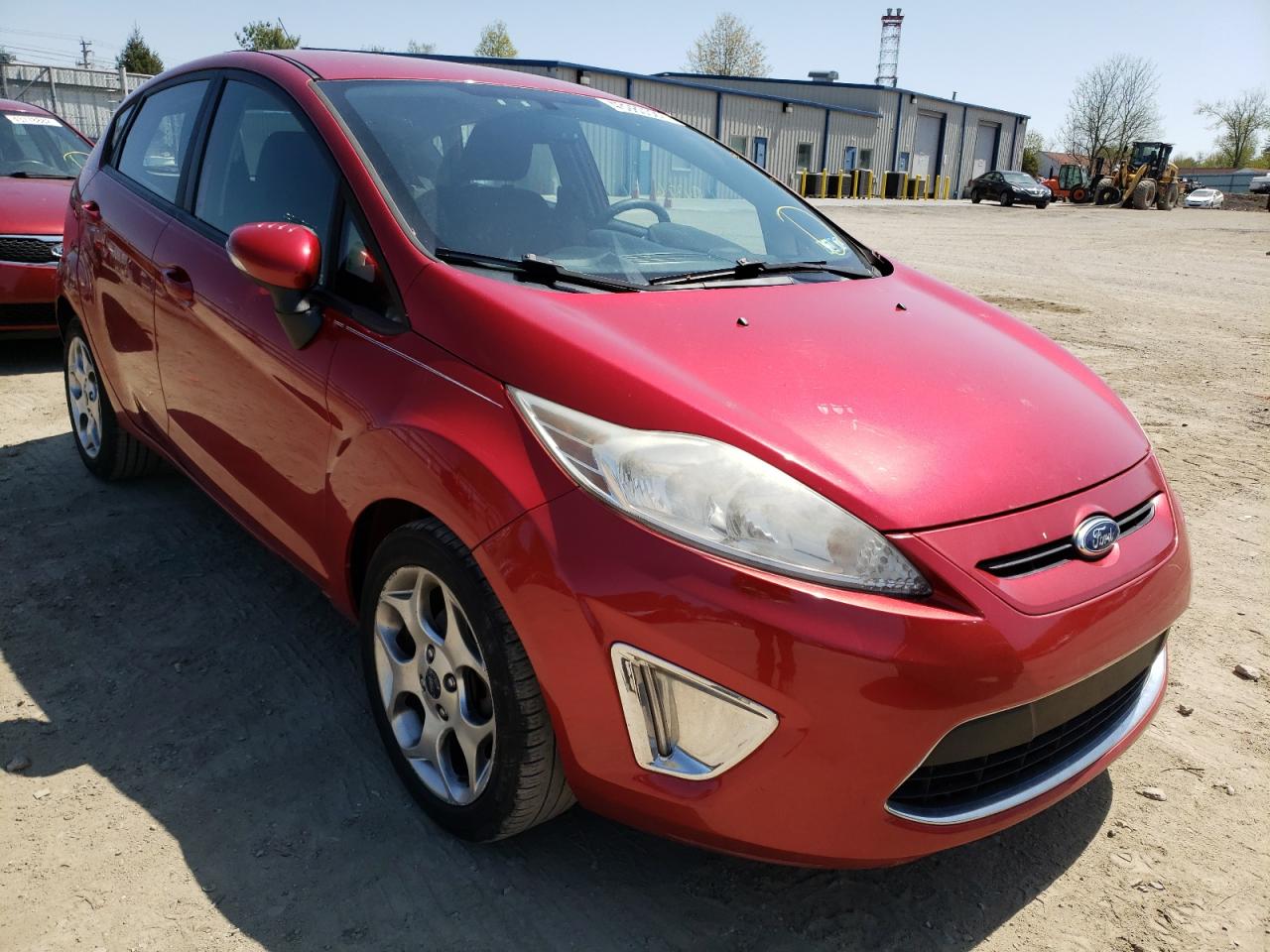 FORD FIESTA SES 2011 with VIN 3FADP4FJ9BM146018 - Photo from auction