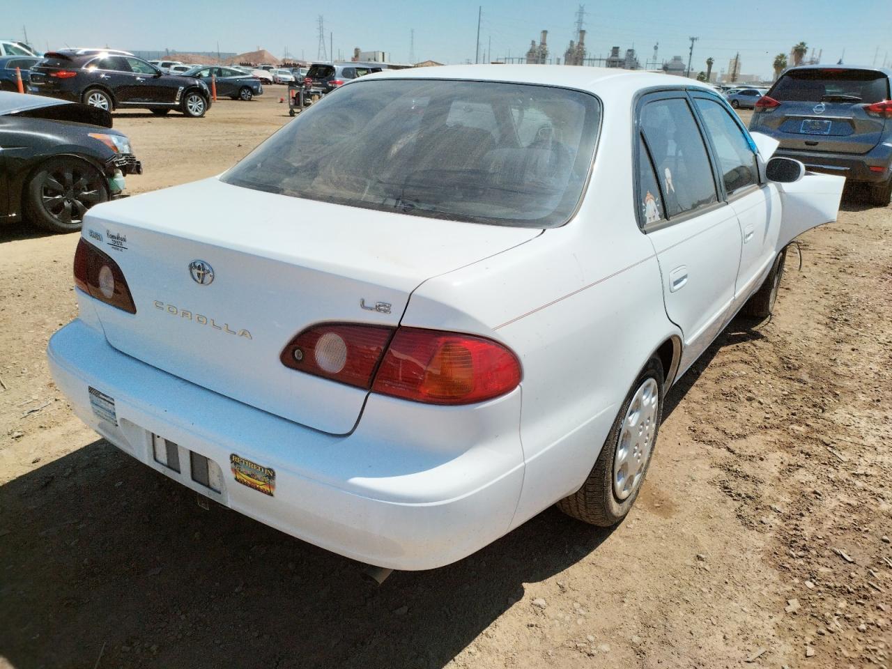 Photo 4 from auction – 2002 TOYOTA COROLLA CE with VIN 1NXBR12E02Z611120