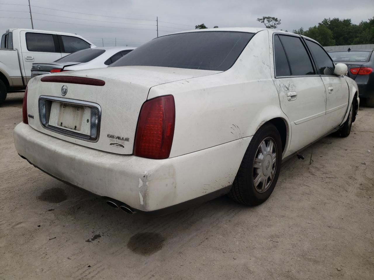 Photo 4 from auction – 2004 CADILLAC DEVILLE with VIN 1G6KD54Y74U117750