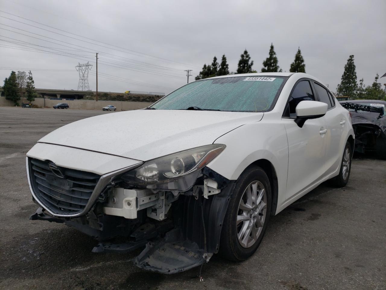 Photo 2 from auction – 2015 MAZDA 3 TOURING with VIN JM1BM1V71F1246437