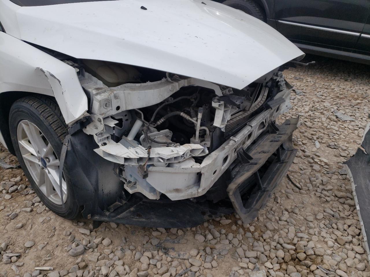 Photo 9 from auction – 2017 FORD FOCUS SE with VIN 1FADP3F24HL296454
