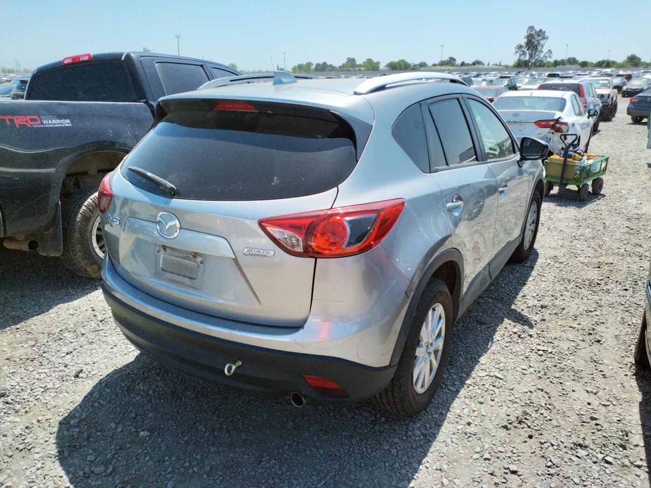 Photo 4 from auction – 2014 MAZDA CX-5 TOURI with VIN JM3KE2CY2E0306929