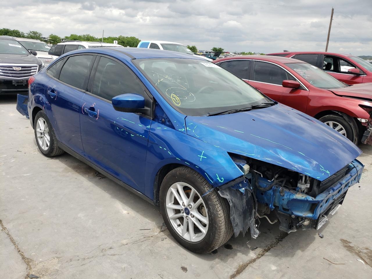FORD FOCUS SE 2018 with VIN 1FADP3F2XJL250424 - Photo from auction