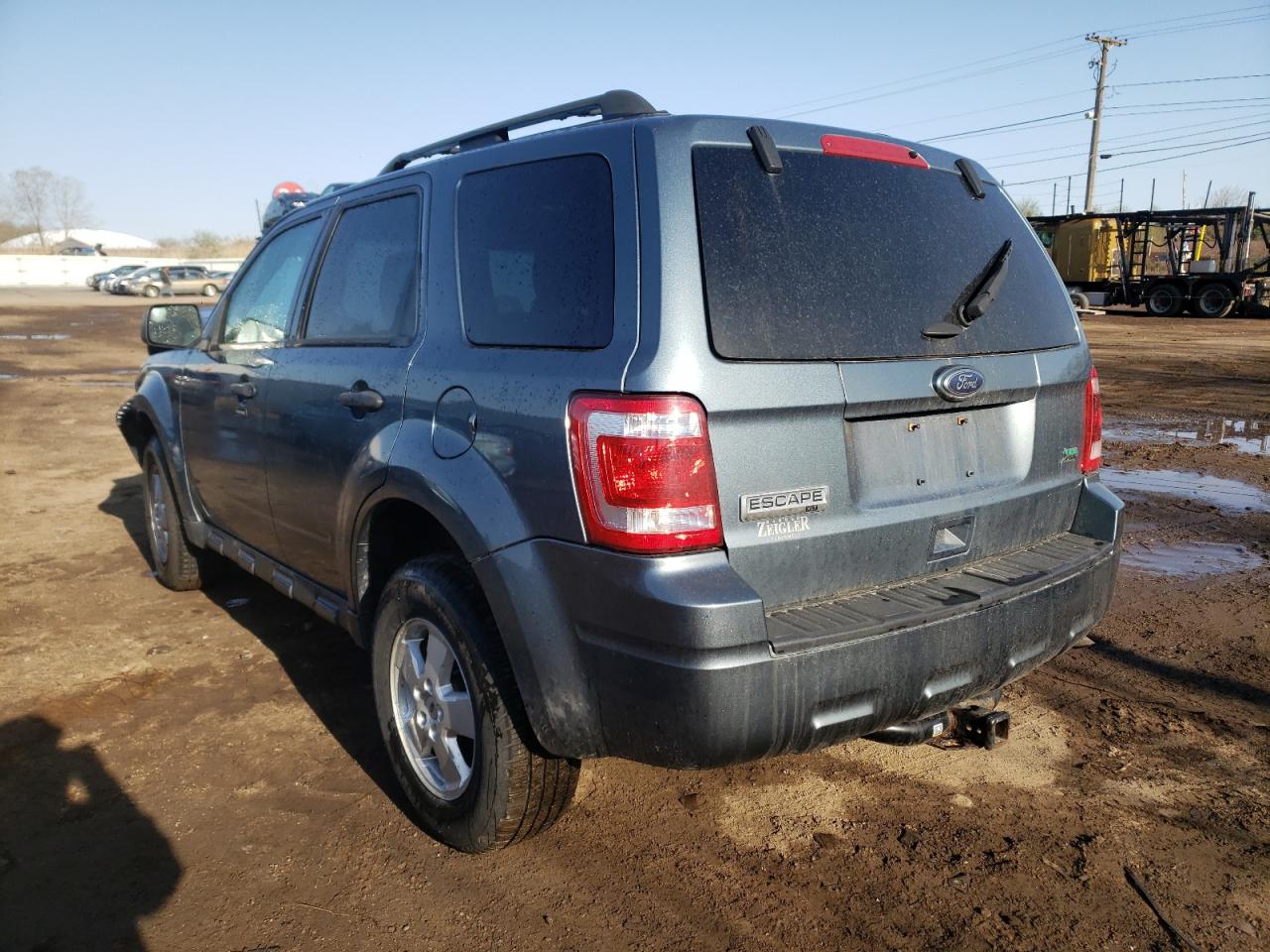 Photo 3 from auction – 2011 FORD ESCAPE XLT with VIN 1FMCU0DG2BKB71845