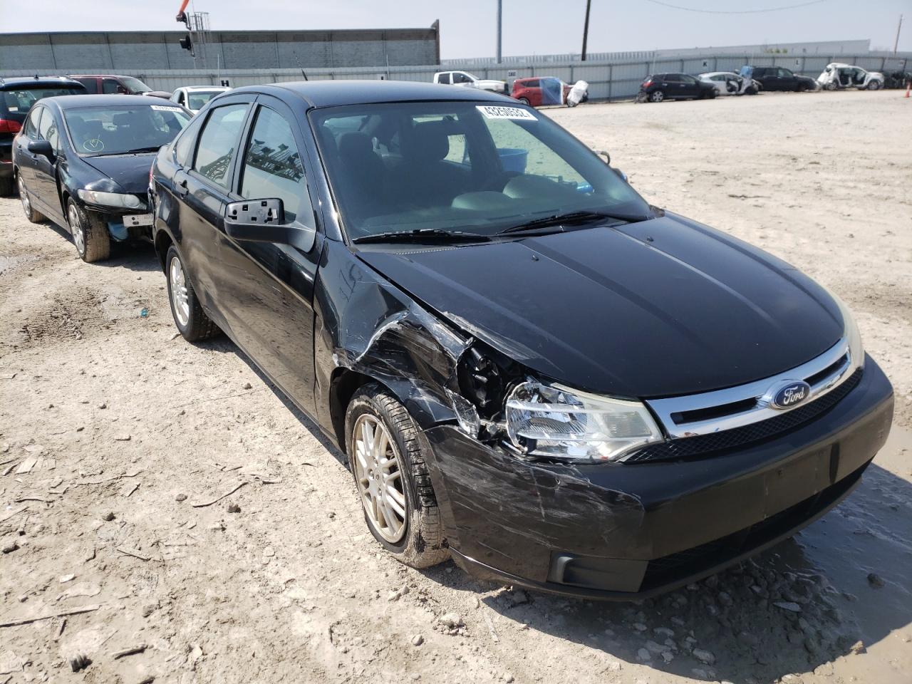 FORD FOCUS SE 2010 with VIN 1FAHP3FN5AW115524 - Photo from auction