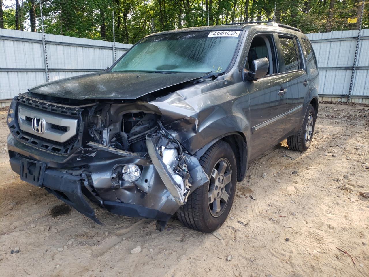 Photo 2 from auction – 2011 HONDA PILOT TOUR with VIN 5FNYF3H95BB046076