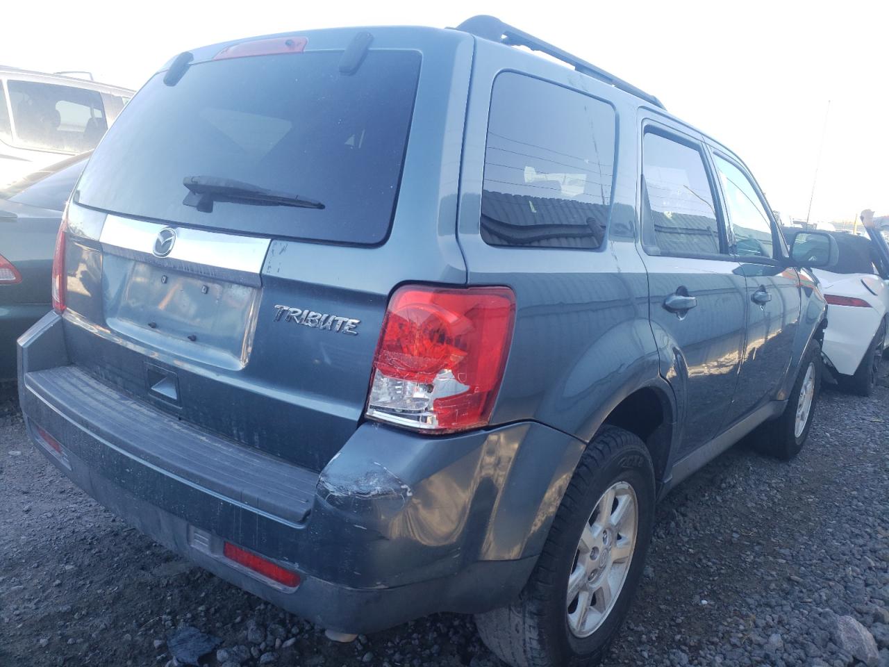 Foto 4 de la subasta – 2010 MAZDA TRIBUTE I con VIN 4F2CY0C75AKM07557