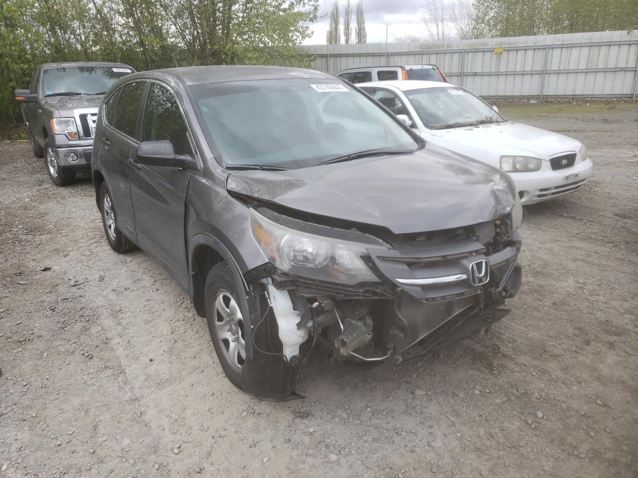 Photo 1 from auction – 2014 HONDA CR-V LX with VIN 2HKRM3H33EH517427