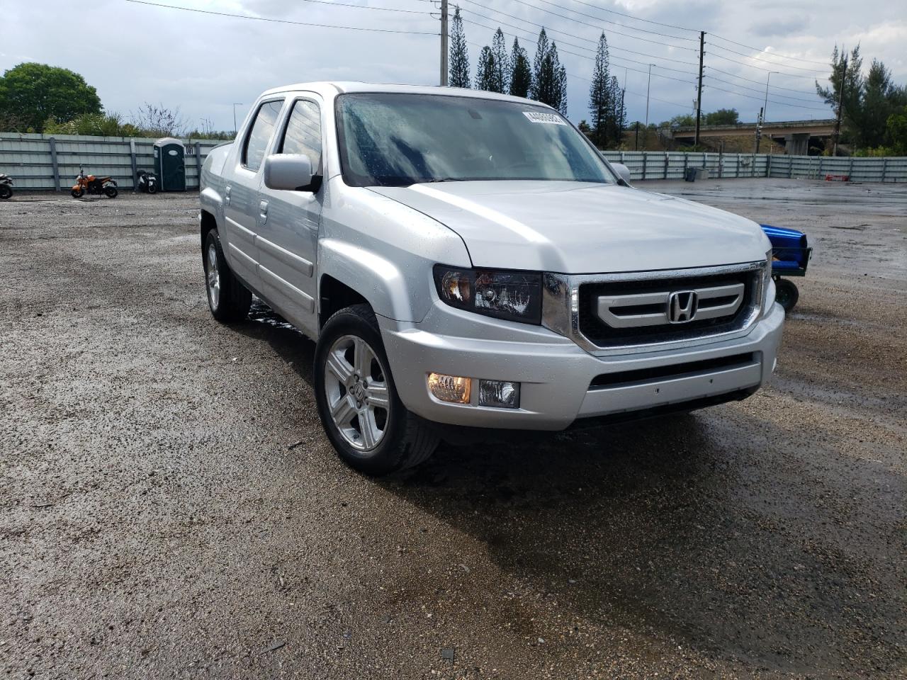 HONDA RIDGELINE 2010 with VIN 5FPYK1F56AB007759 - Photo from auction