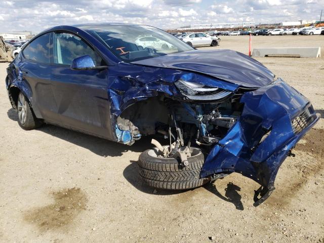 TESLA MODEL Y 2022 with VIN 7SAYGAEEXNF348022 - Photo from auction