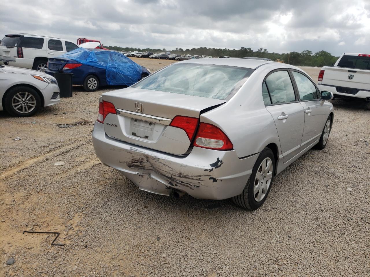 Photo 4 from auction – 2011 HONDA CIVIC LX with VIN 19XFA1F52BE012712