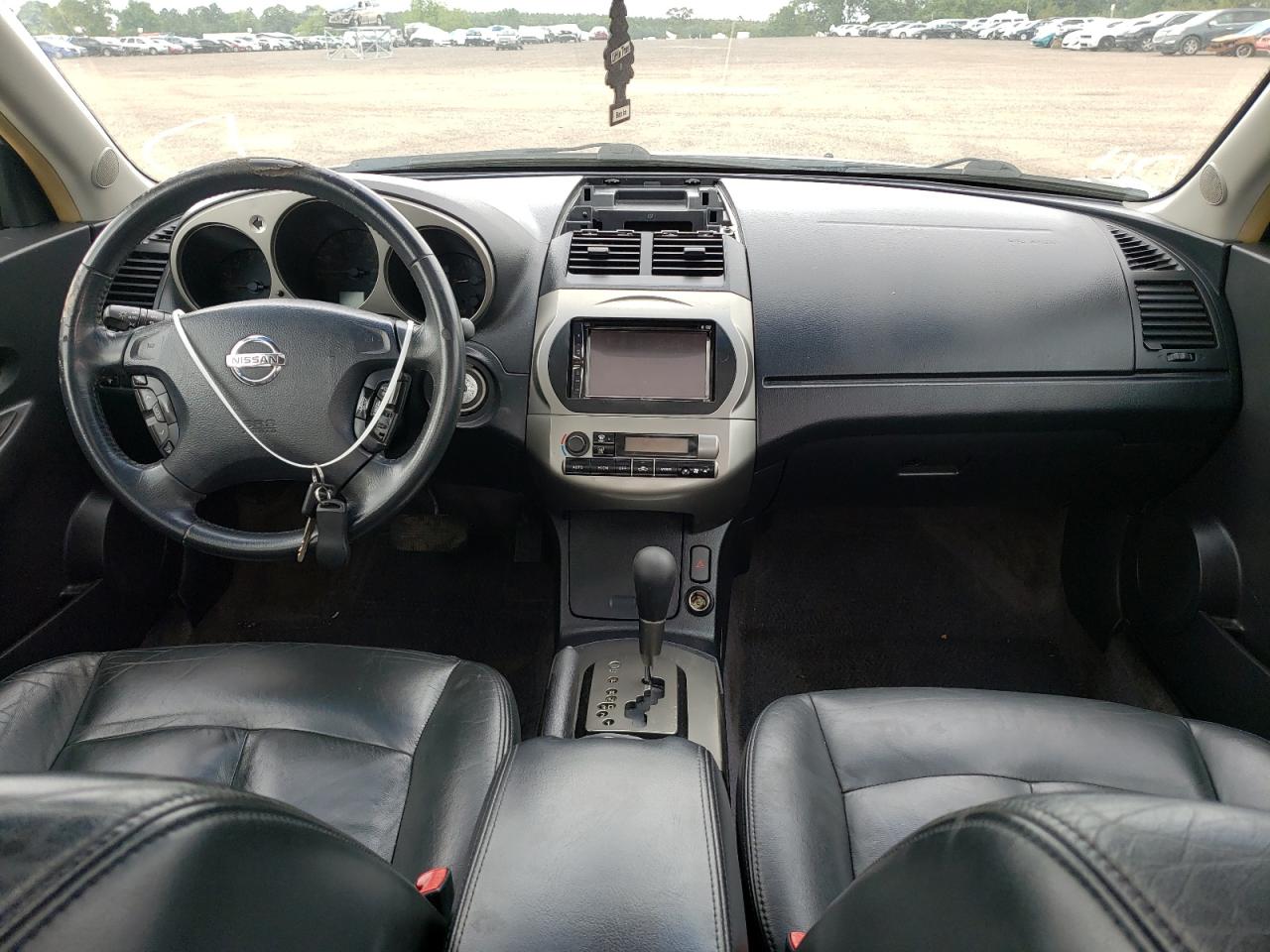 Photo 9 from auction – 2004 NISSAN ALTIMA SE with VIN 1N4BL11D44C187180
