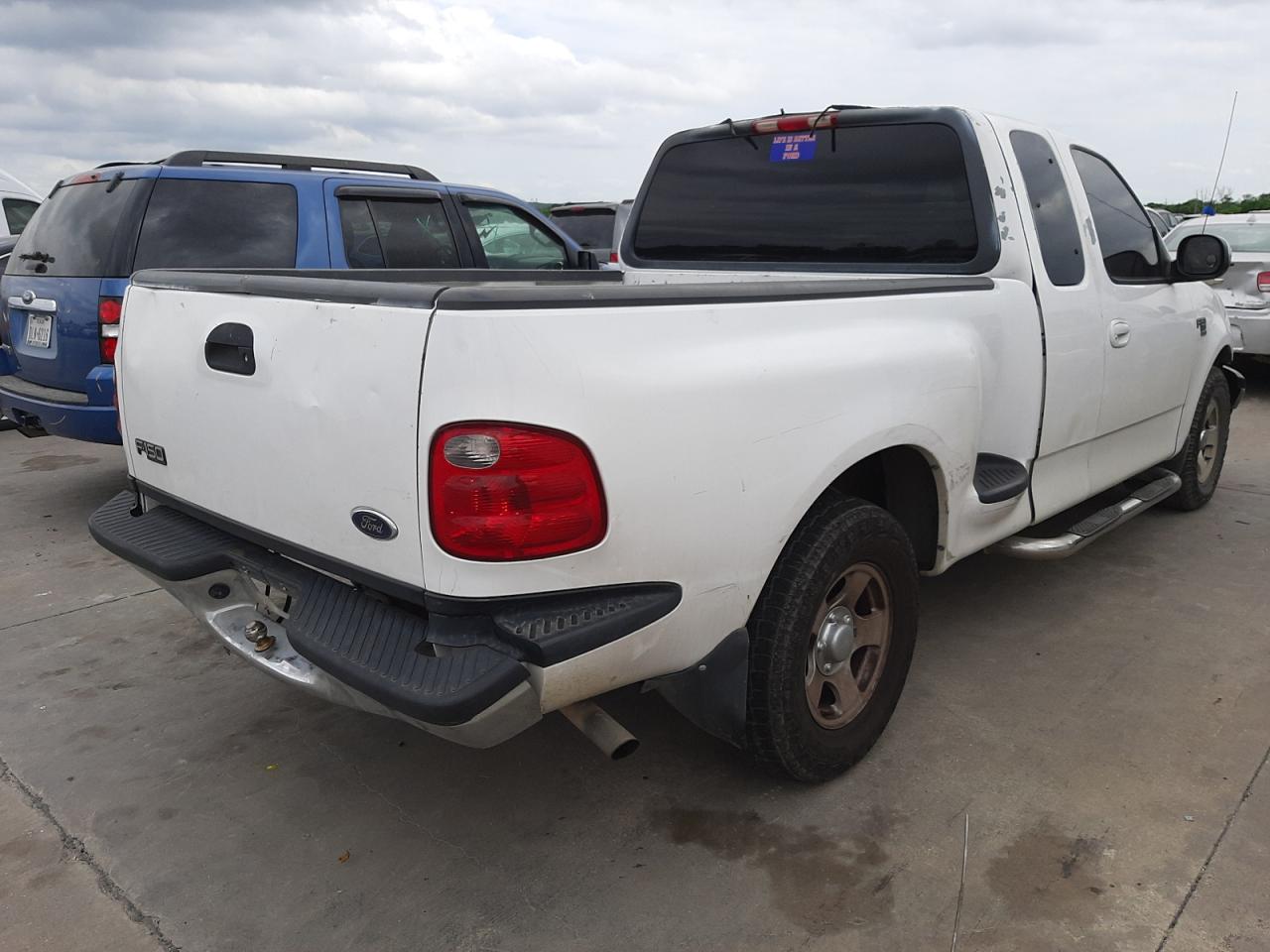 Photo 4 from auction – 2001 FORD F150 with VIN 1FTRX07W41KA56445