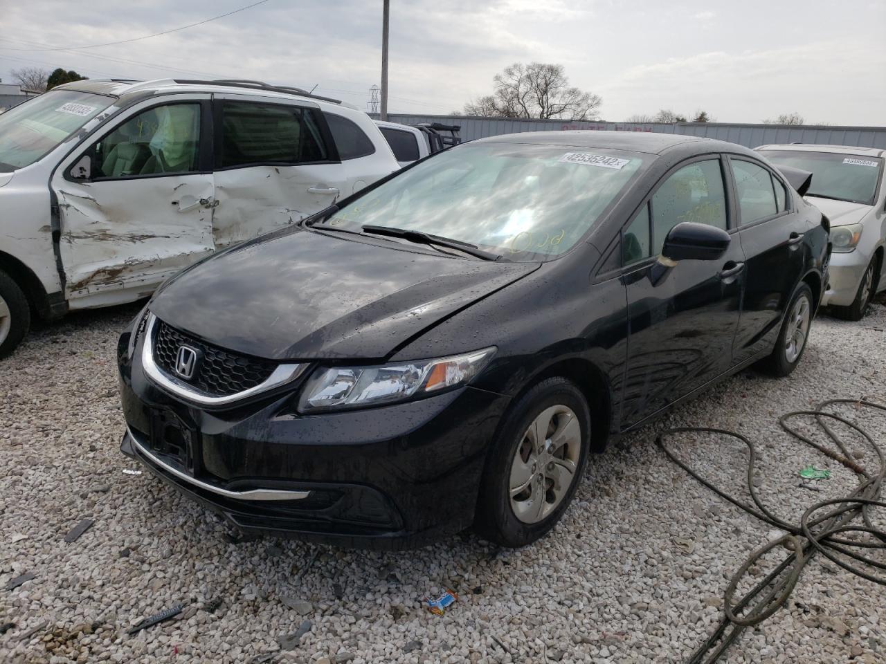 Photo 2 from auction – 2014 HONDA CIVIC LX with VIN 19XFB2F56EE052640
