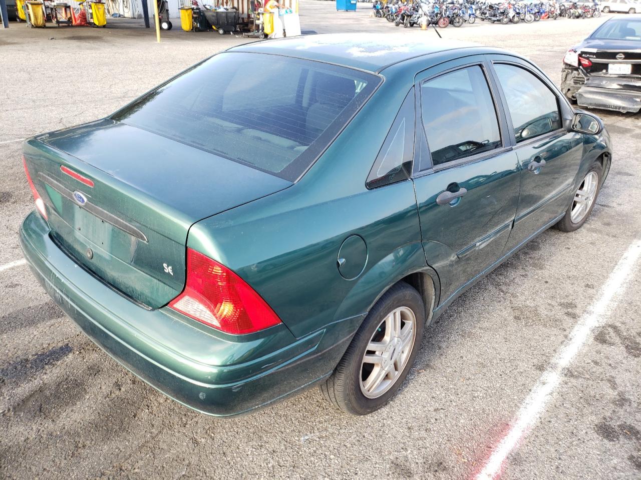 Photo 4 from auction – 2000 FORD FOCUS SE with VIN 1FAFP34P4YW289798