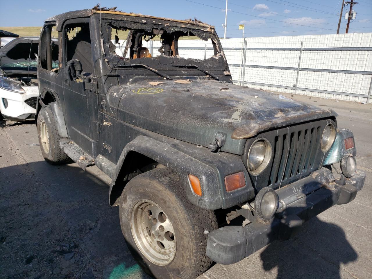 JEEP WRANGLER / 1998 with VIN 1J4FY19SXWP758452 - Photo from auction